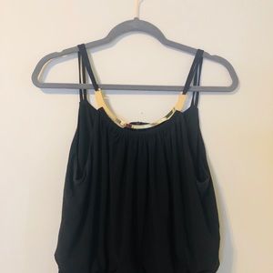 Black jumpsuit with gold plated neck